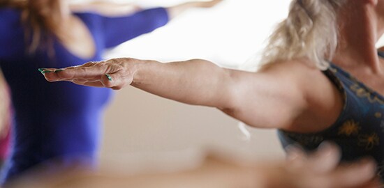 A woman who is doing yoga.
